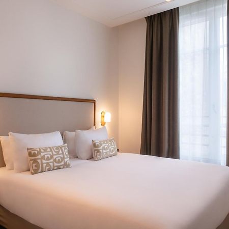 Le Lampika Hotel Parijs Kamer foto