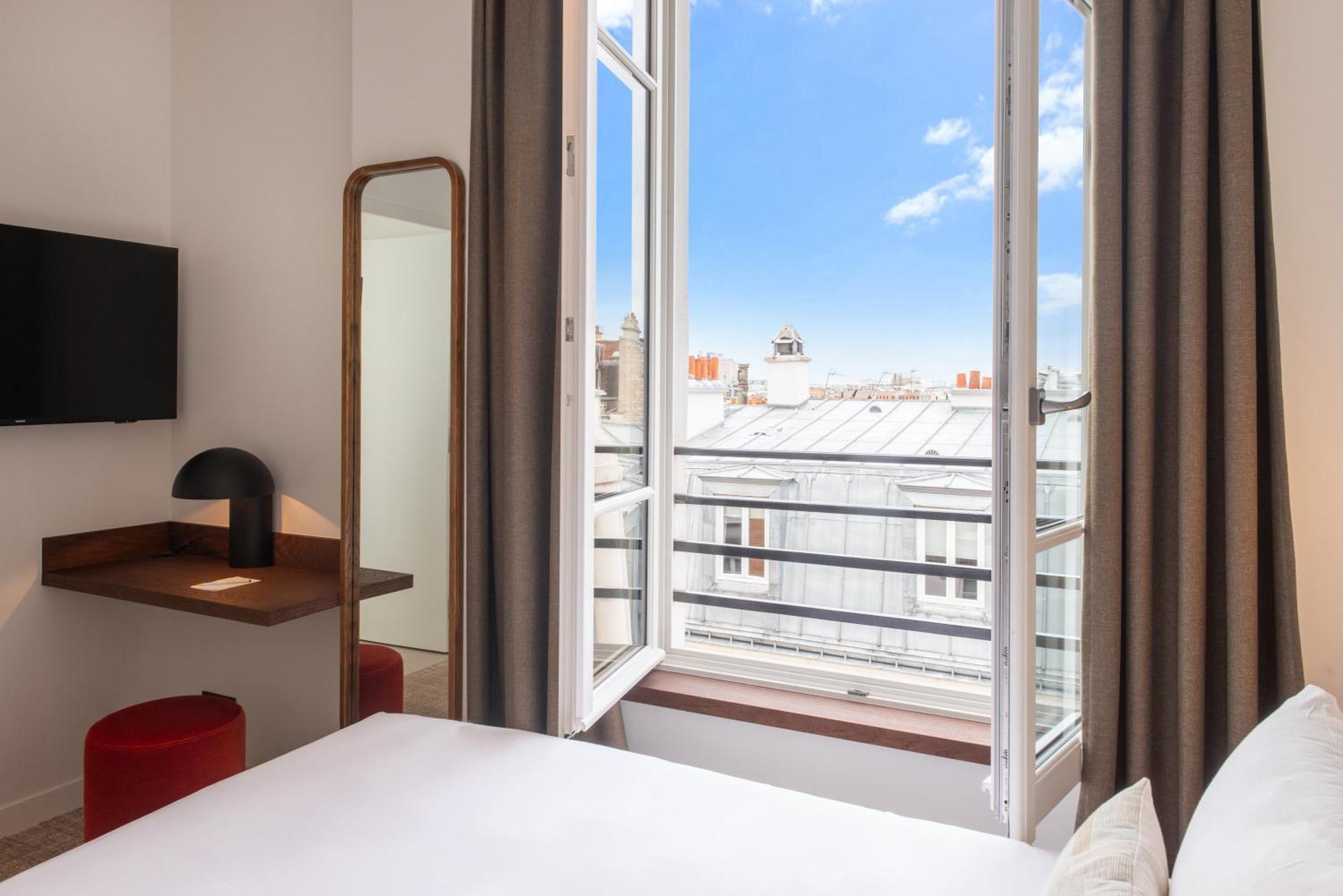 Le Lampika Hotel Parijs Kamer foto